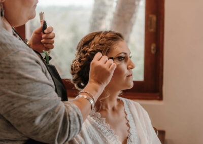Kym and Me professional makeup being done on a bride
